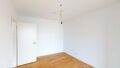 Leeres Zimmer mit Holzboden